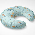 A U-shaped baby nursing pillow with a light blue mermaid and sea creature print, featuring the personalized name 'ANNA catherine' in script.