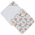 Pale blue hooded towel featuring colorful monster trucks with oversized tires, flame details, and the name Ryder in dark lettering.