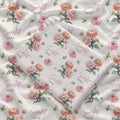 Ivory swaddle blanket with peach and pink chrysanthemums, green foliage, and the name Scarlett Mae in rose and green lettering.