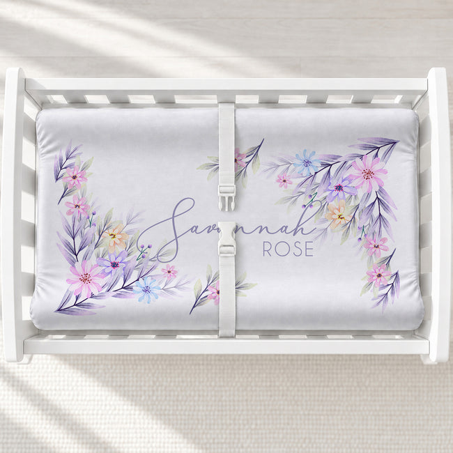 Pastel Watercolor Wildflowers Personalized Changing Pad Cover, featuring delicate pastel blooms and baby’s name for a sweet nursery touch.