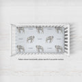 Little Elephant crib sheet personalized with Cooper in a white crib; caption notes horizontal pattern placement, with vertical available by request.