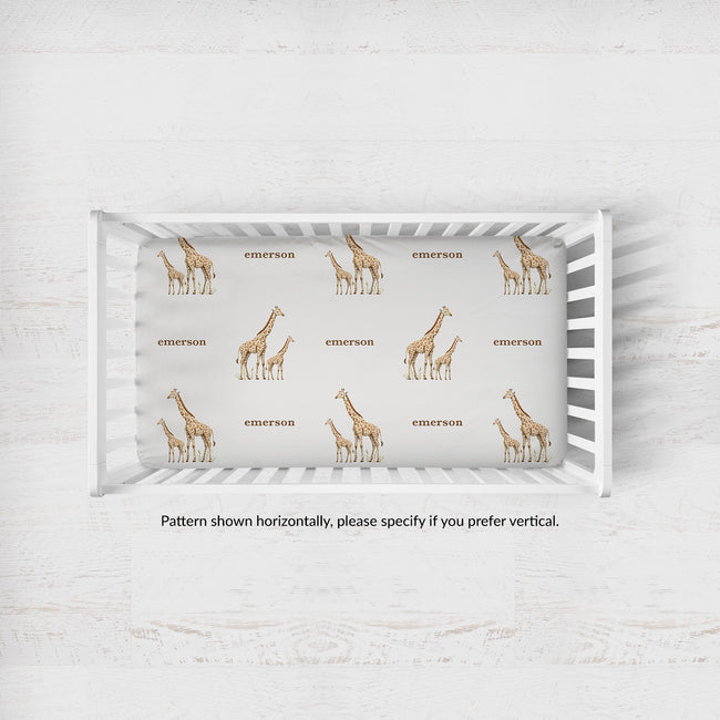 Little Giraffe crib sheet personalized with Emerson, shown with a horizontal pattern; vertical orientation available by request.