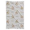 Full view of Little Giraffe personalized swaddle blanket with watercolor adult and baby giraffes and the name Emerson on white.