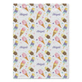 A blanket, featuring a repeating pattern of watercolor ice cream cones, popsicles, small hearts, and the name 'Abigail' in purple script. The background of the pattern is white, and the fabric is shown flat against a clean white background.