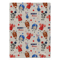 A personalized throw blanket featuring a repeating pattern of football-themed cartoon characters, including helmets, footballs, cheerleaders, stars, and the text 'HENRY Thomas' on a light beige background.