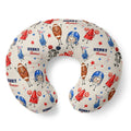 Personalized U-shaped nursing pillow with a white background and a colorful cartoon football theme, featuring the name 'HENRY' and 'Thomas' printed on it.