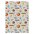 Personalized sports blanket featuring basketball, baseball, soccer, golf, volleyball, football, tennis and with name Cooper on it