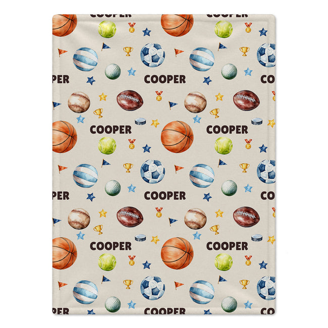 Personalized sports blanket featuring basketball, baseball, soccer, golf, volleyball, football, tennis and with name Cooper on it