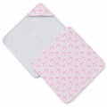 Pale pink hooded towel with pink ribbon bows, tiny sparkle accents, and the name Charlotte Mae repeated throughout.