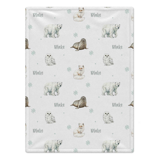 Personalized Arctic Animals Baby Blanket. Gentle arctic animals surround a custom name in a soft winter-inspired watercolor design.