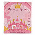 Pink princess castle baby girl milestone blanket personalized with Gracie Anne, featuring a yellow crown, rainbow, and numbers 1–12.
