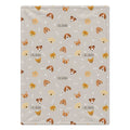 A personalized baby blanket featuring a repeating pattern of cartoon dog faces, bones, and paw prints on a light beige background. The name 'CALLAHAN' is printed in black text next to several dog illustrations.