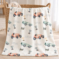 Personalized Race Car Baby Blanket. Vintage-style race cars in coral and mint, trophies, and checkered flags surround a custom name.