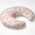 A U-shaped nursing pillow with a whimsical unicorn and rainbow print on a light cream background, featuring the brand name 'ELIZA Sleep' printed repeatedly.