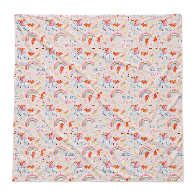 A personalized baby swaddle blanket featuring a repeating pattern of pastel-colored unicorns, rainbows, and the text 'ELIZA Grace' on a light cream background.
