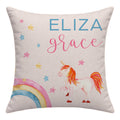 Personalized square throw pillow featuring a watercolor-style unicorn, rainbow, and stars with the names 'ELIZA' and 'grace' printed on a light beige fabric background.