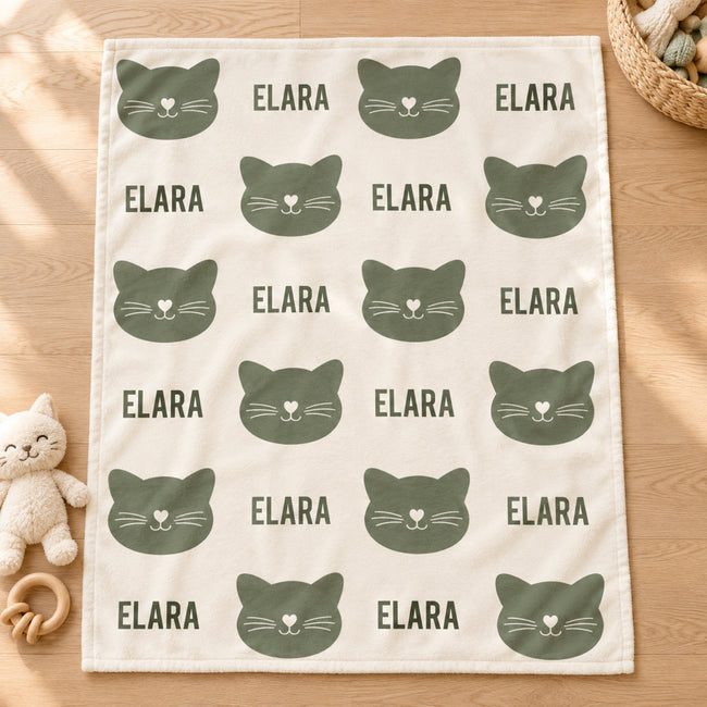 Personalized Sage Cat Baby Blanket. Sage green cat silhouettes surround a custom name in a simple, modern design on a light background.