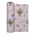 Mauve-pink swaddle blanket with lavender aster bouquets, golden centers, green leaves, and the name Evelyn Claire.
