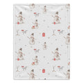 A personalized baby blanket with a white background featuring a repeating pattern of snowmen, small red gift boxes, and the name 'Jack Wyatt' in red script.