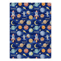 Space Explorers baby blanket personalized with Scout, draped over a wooden crib and featuring watercolor planets and rockets on navy.