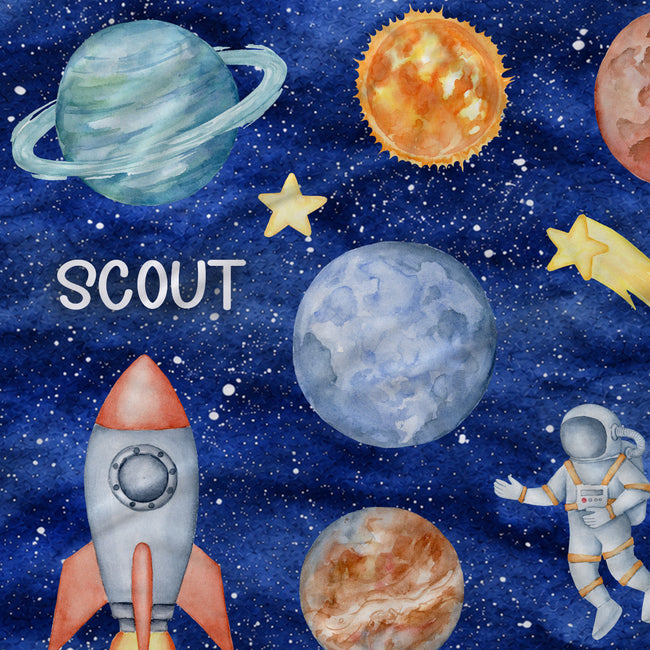 Watercolor-style space-themed fabric featuring planets, stars, a rocket, and an astronaut on a blue starry background, with the word "SCOUT" printed in white near the left side.