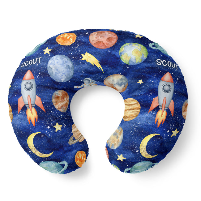 Top view of the Space Explorers personalized nursing pillow cover with Scout lettering, watercolor rockets, planets, and golden crescent moons.