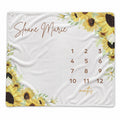 Personalized Sunshine and Sunflowers baby milestone blanket with yellow sunflowers, greenery, custom name, and months 1–12