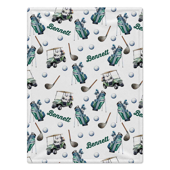 A personalized golf-themed blanket featuring a repeating pattern of green and teal golf bags, golf carts, golf clubs, golf balls, and the name 'Bennett' printed in green script on a white background.
