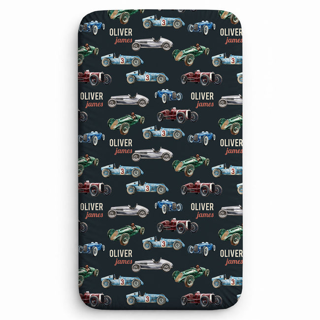 personalized vintage race cars twin sheet featuring watercolor vintage race cars in red, blue, green and silver.