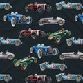 A repeating pattern of vintage racing cars in blue, red, green, and silver on a dark charcoal background. The cars are illustrated in a retro watercolor style, with several featuring the number 3 on the side.