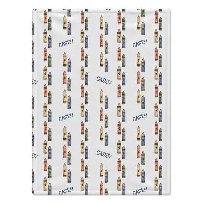 A square fabric item, likely a blanket or towel, featuring a repeating pattern of colorful boats and the name 'CASEY' printed in navy blue on a white background.