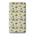 A personalized twin fitted sheet featuring a repeating pattern of colorful cartoon dinosaurs on a light beige background.
