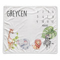 Personalized watercolor safari baby milestone blanket with giraffe, elephant, lion, zebra, tropical leaves, custom name, and months 1–12