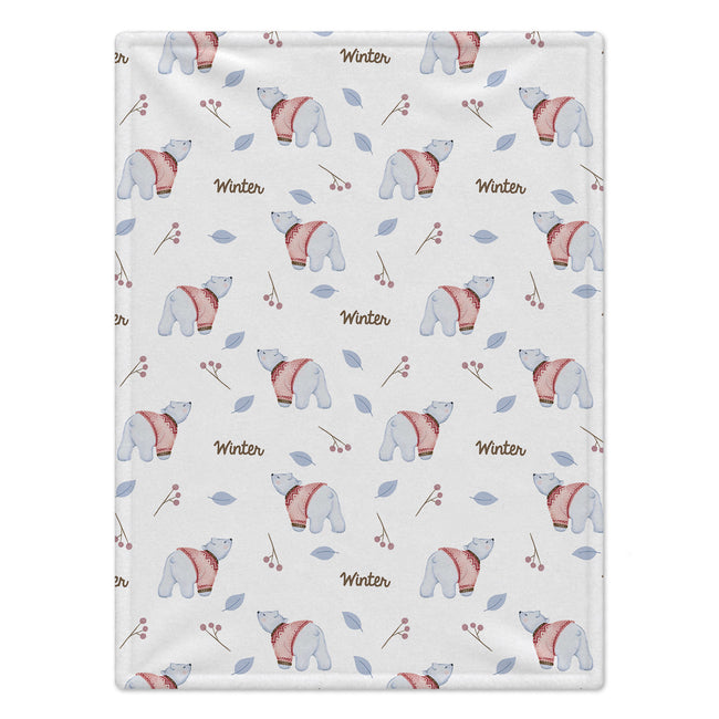Personalized Polar Bear Baby Blanket. Gentle polar bears in pink sweaters, blue leaves, and berry sprigs surround a custom name on a white background.