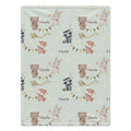 A personalized baby blanket with a repeating pattern of woodland animals (bears, rabbits, foxes, raccoons) flying balloons, decorated with bunting and stars, and customized with the name 'Charlie' in brown text.