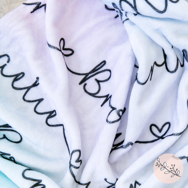 Close up up the personalized pastel ombre blanket