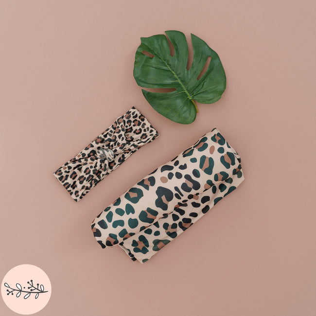 Animal print baby swaddle and headband